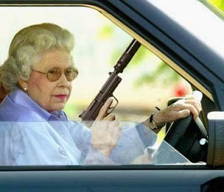 grandma-holding-a-gun-in-a-car.jpg