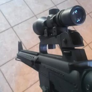 715T w/ 3-9x20 tac scope