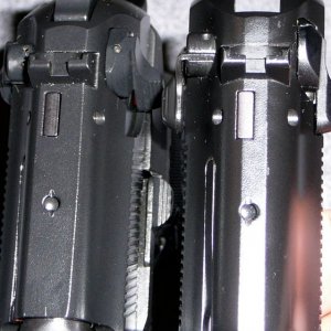 92A1 (left) note wider flat portion on slide top compared to 92FS (right)