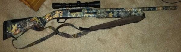 Mossberg 500 12ga combo. slug barrel shown. Waterfowl barrel in safe.