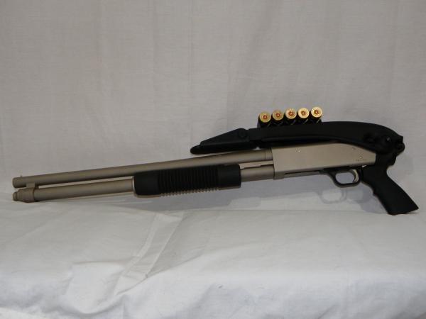 Mossberg 590 with marinecote finish and ATI folding stock